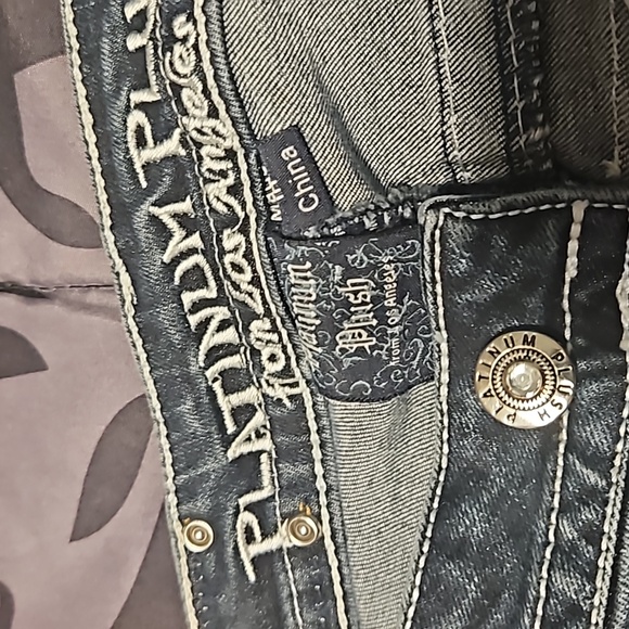 A pair of boot-cut  Platinum Plush jeans - Picture 2 of 11